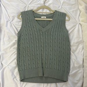 Green sweater vest